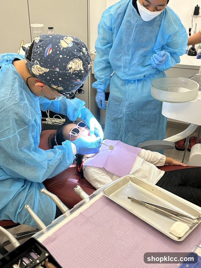 Dentist examining a child's teeth