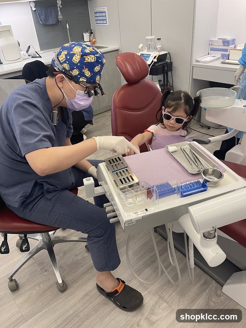 Dentist with young patient