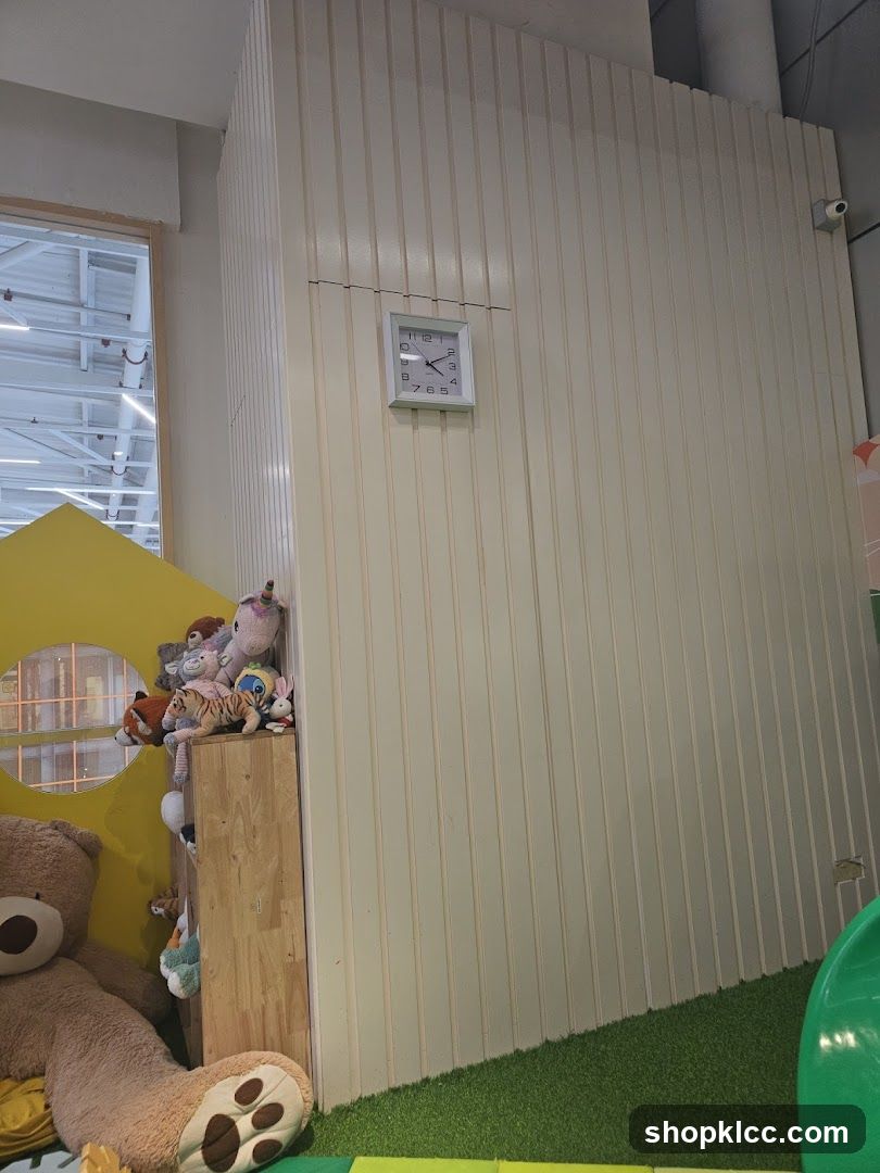 Play area with stuffed animals and clock
