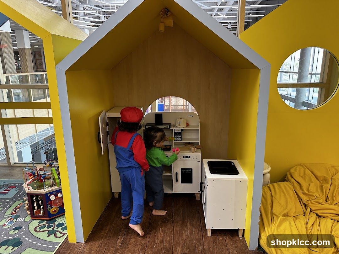 Children Playing in a Play Kitchen