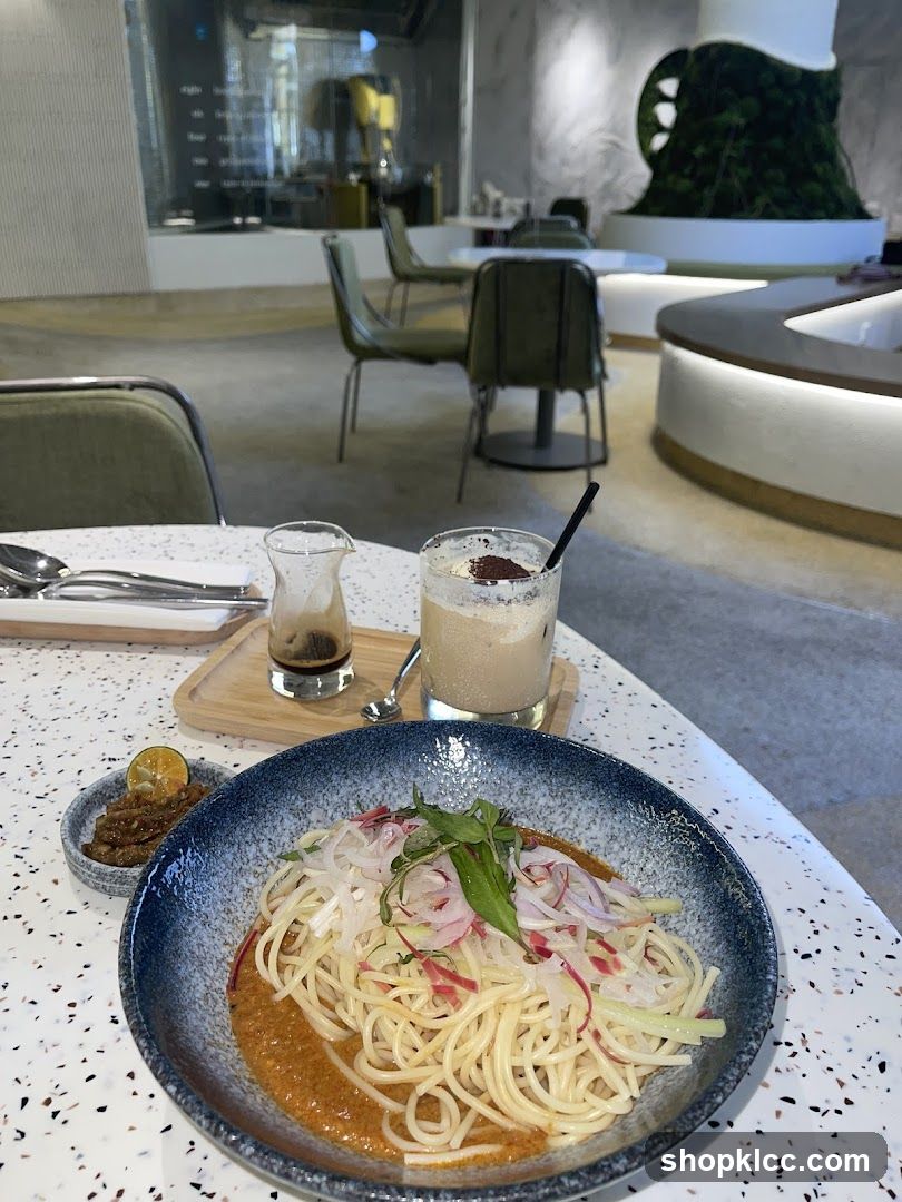 A table setting with food and drink in a cafe