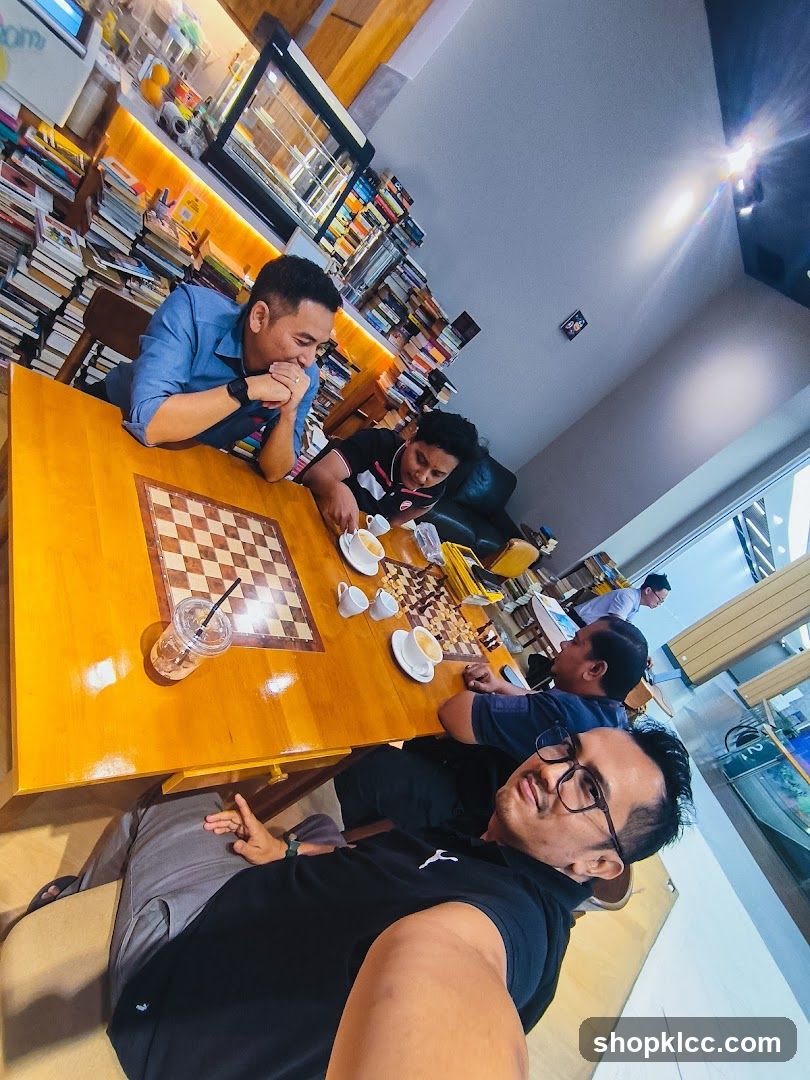 People playing chess in a cafe