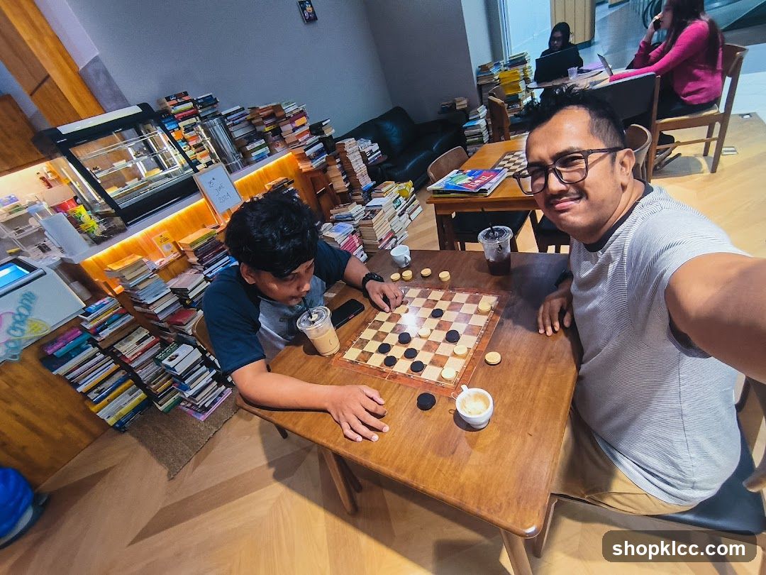 People playing checkers in a cafe