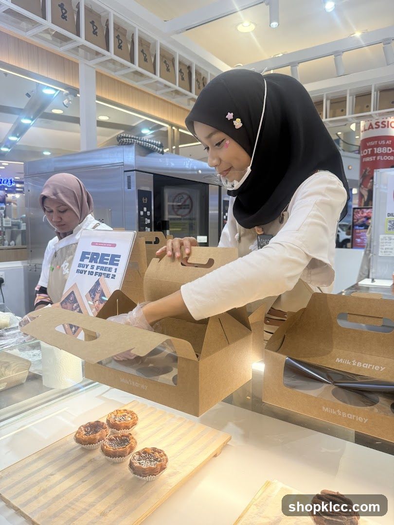 Bakery Staff Packaging Pastries