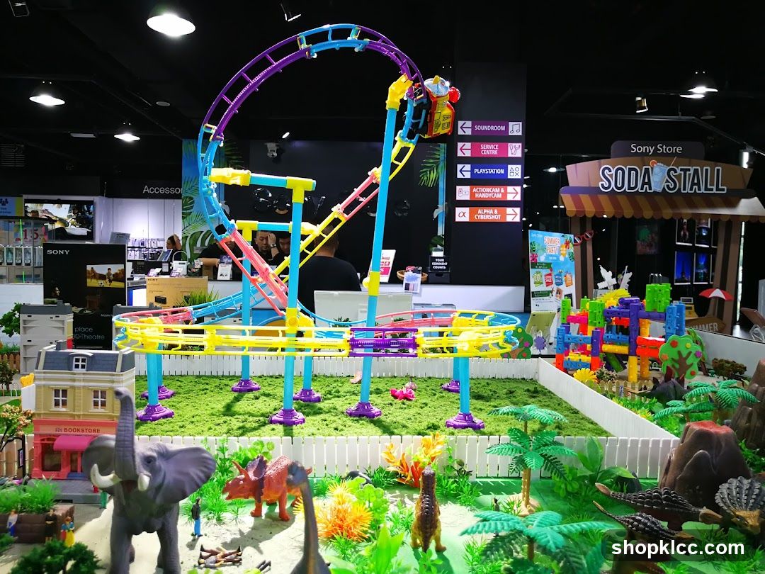 Toy Display with Roller Coaster and Dinosaurs