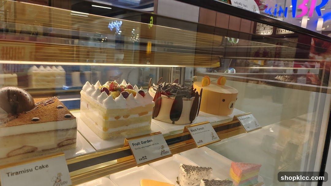 Cakes in a display case