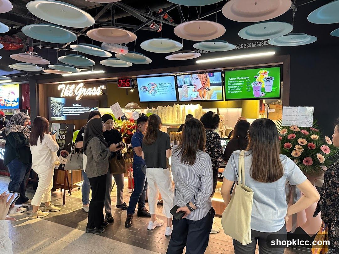 People waiting in line at a food establishment