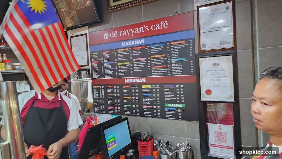 Cafe Interior with Menu Board and Staff
