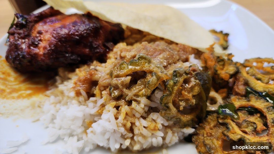 Plate of Indian Curry Rice with Fried Snacks