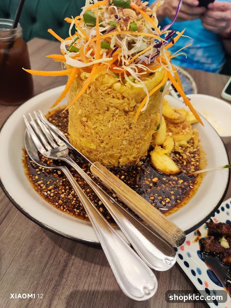 Cylindrical Fried Dish with Garnish