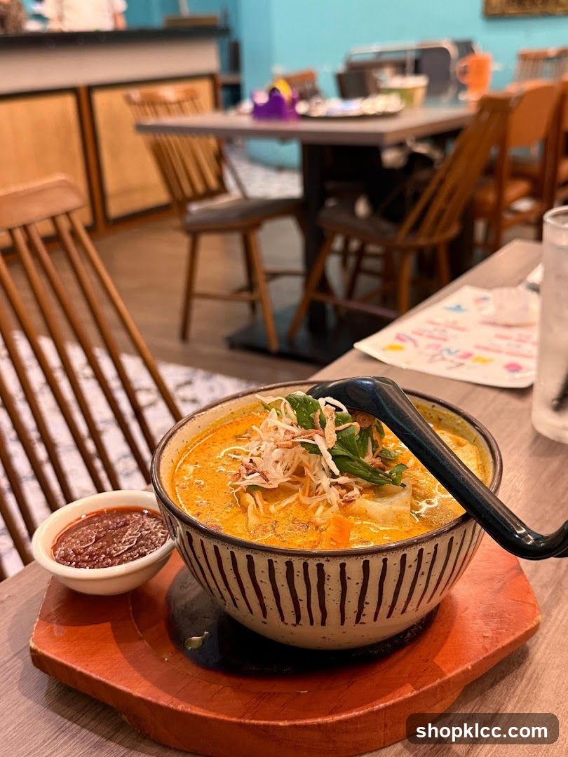Bowl of Curry with Side Dipping Sauce