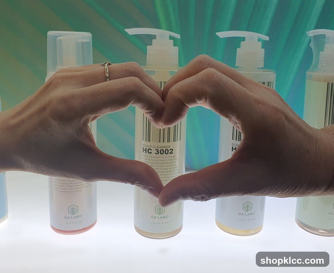 Hand forming heart shape with skincare products