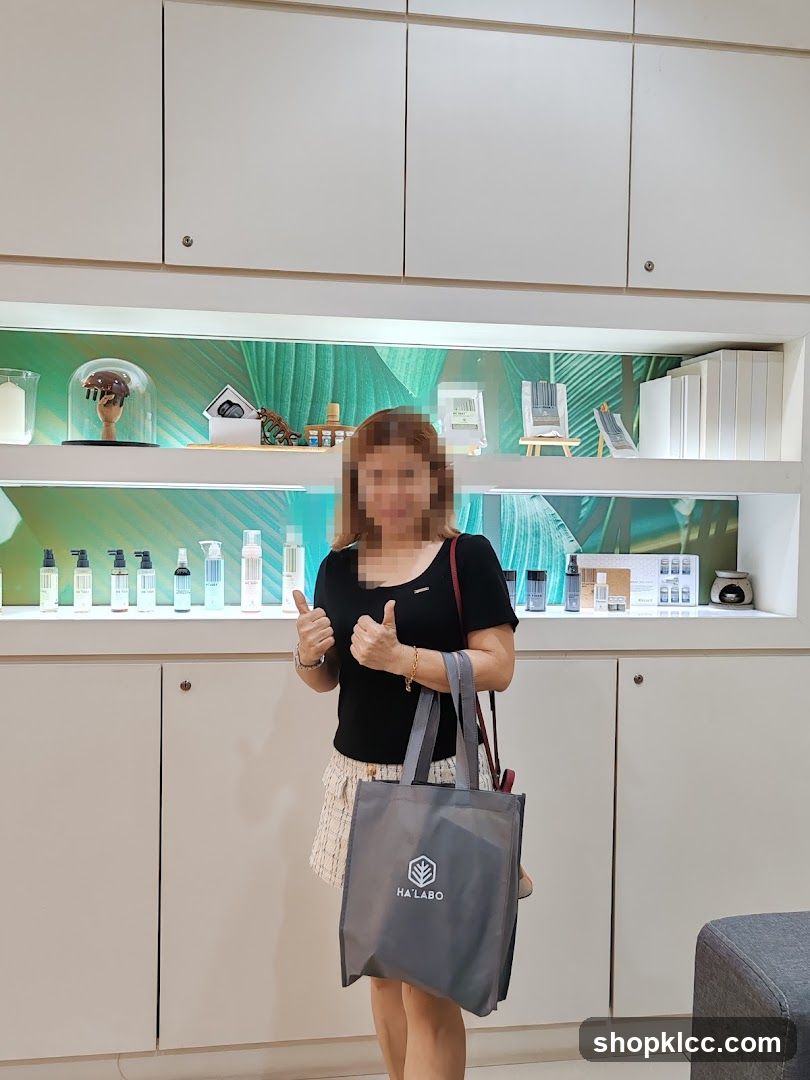 Woman with shopping bag in store interior