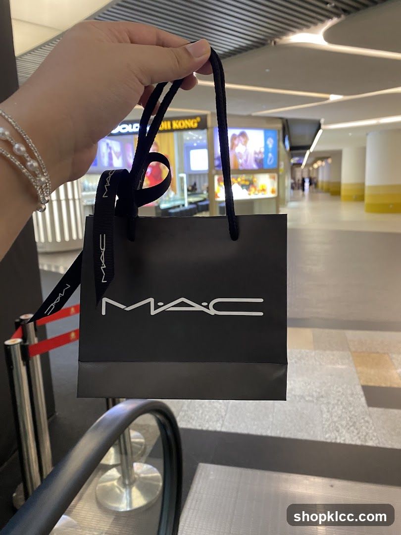 MAC Shopping Bag in Airport Terminal