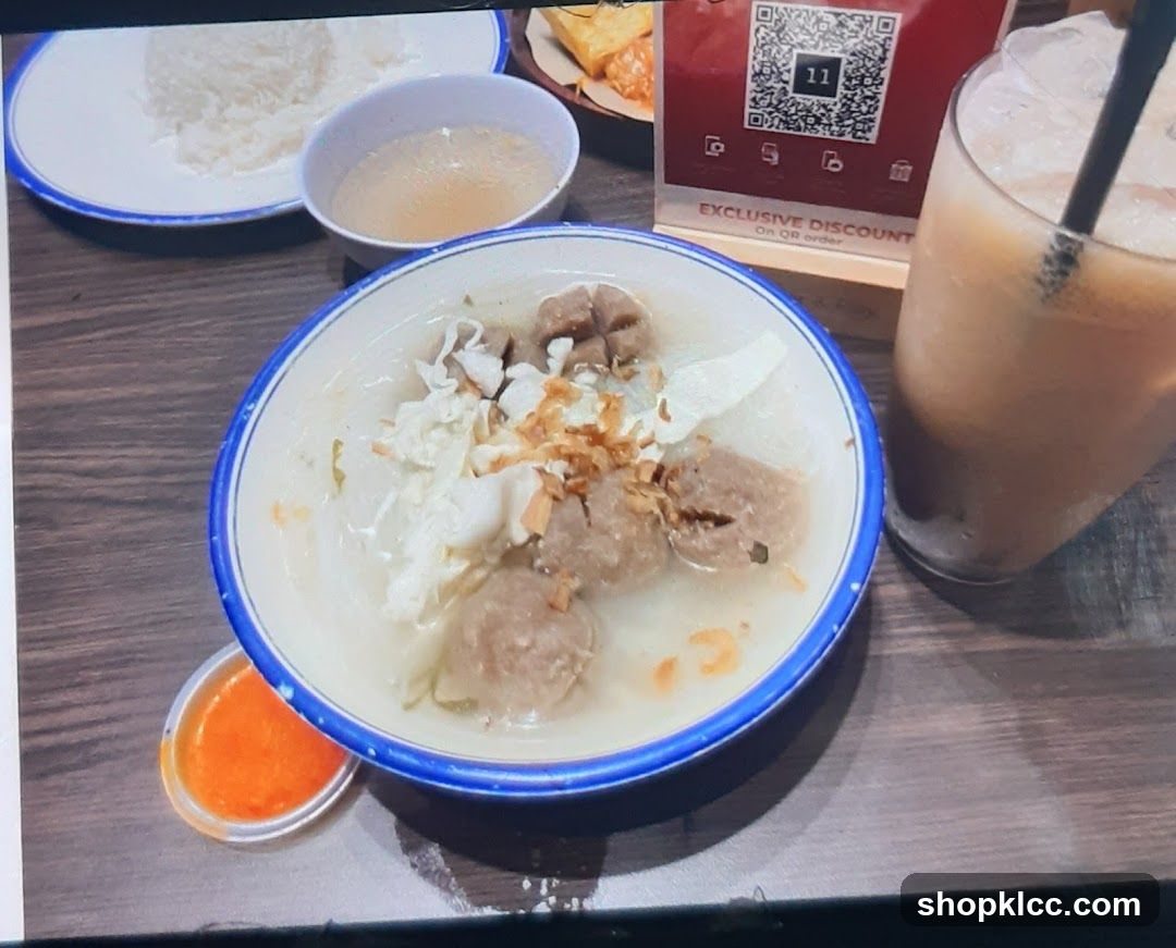 Meatball Soup with Rice and Drink