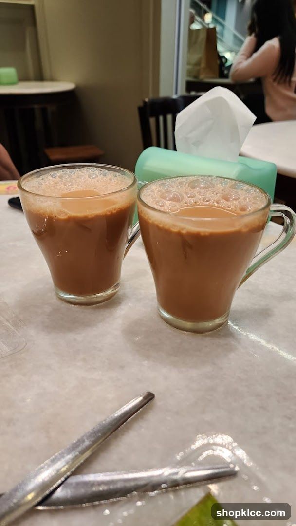 Two cups of iced coffee on a table