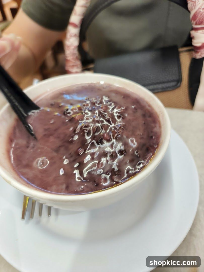 Bowl of Purple Porridge with Toppings