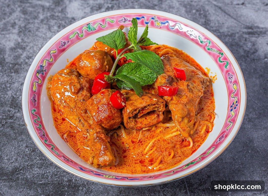 Curry Dish with Meatballs and Mint Garnish