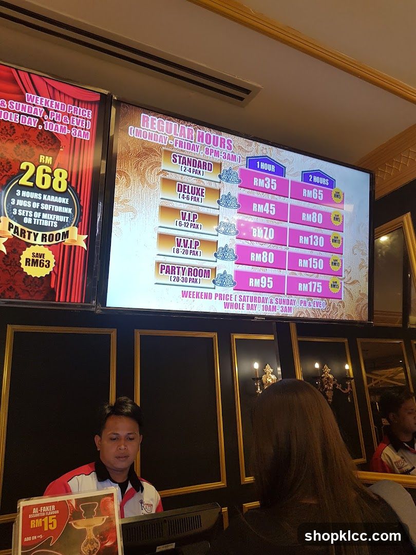 Karaoke Room Price Board and Staff