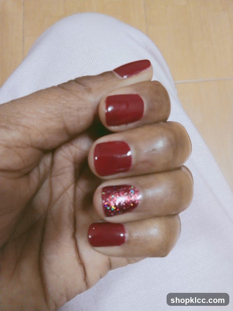 Red Nails with Glitter Accent