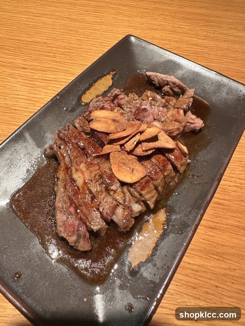 Sliced Steak with Crispy Garlic