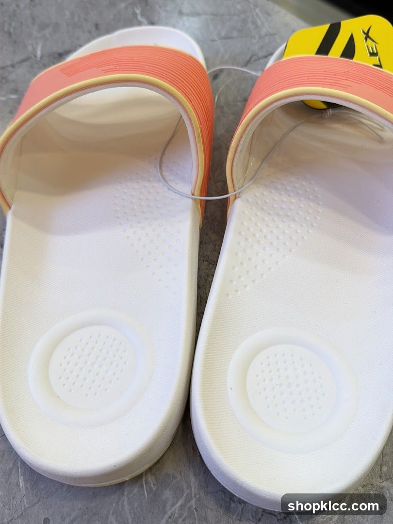 Slippers with orange strap and white sole