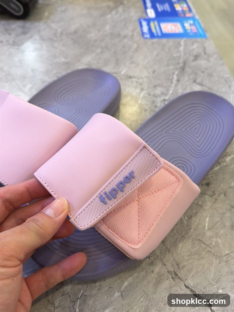 Pink Flipper Slides on Marble Floor