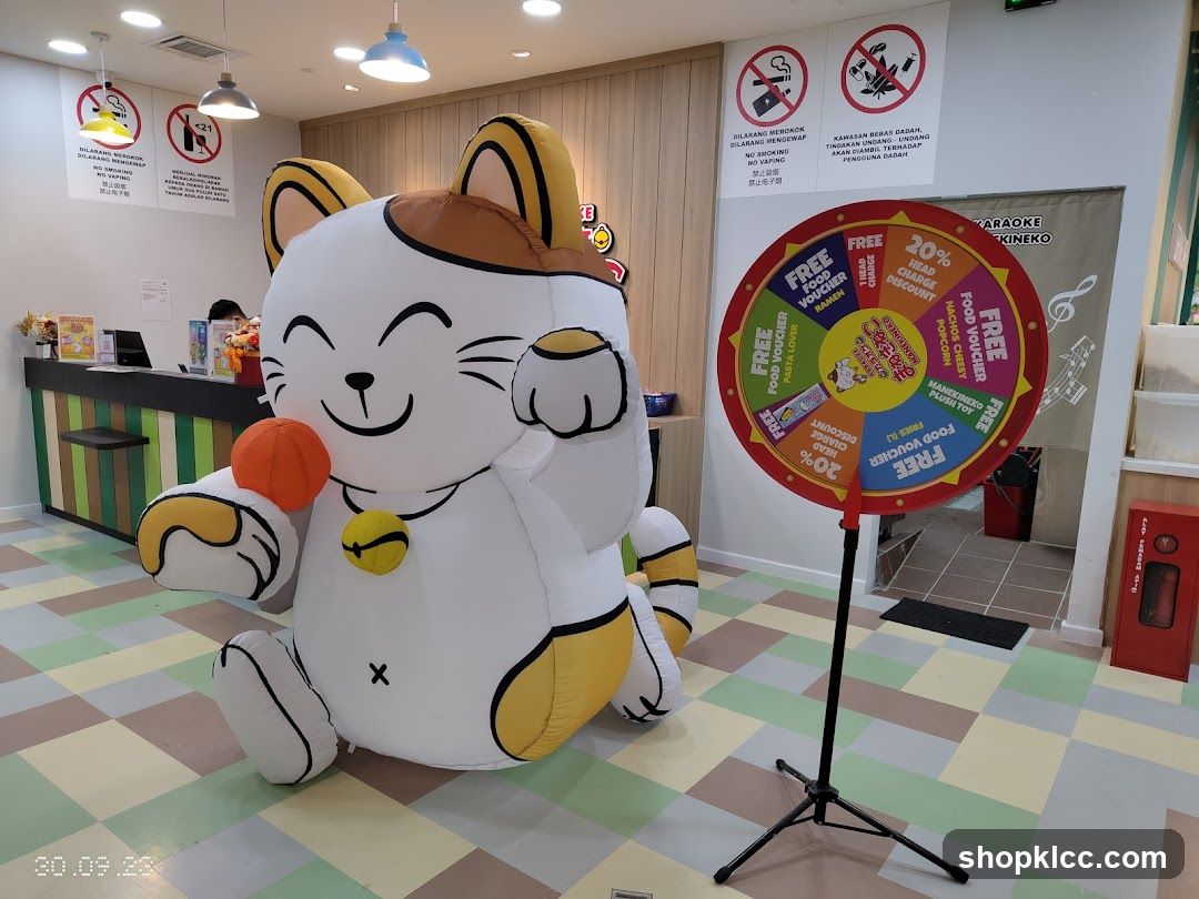 Inflatable Cat Mascot and Prize Wheel
