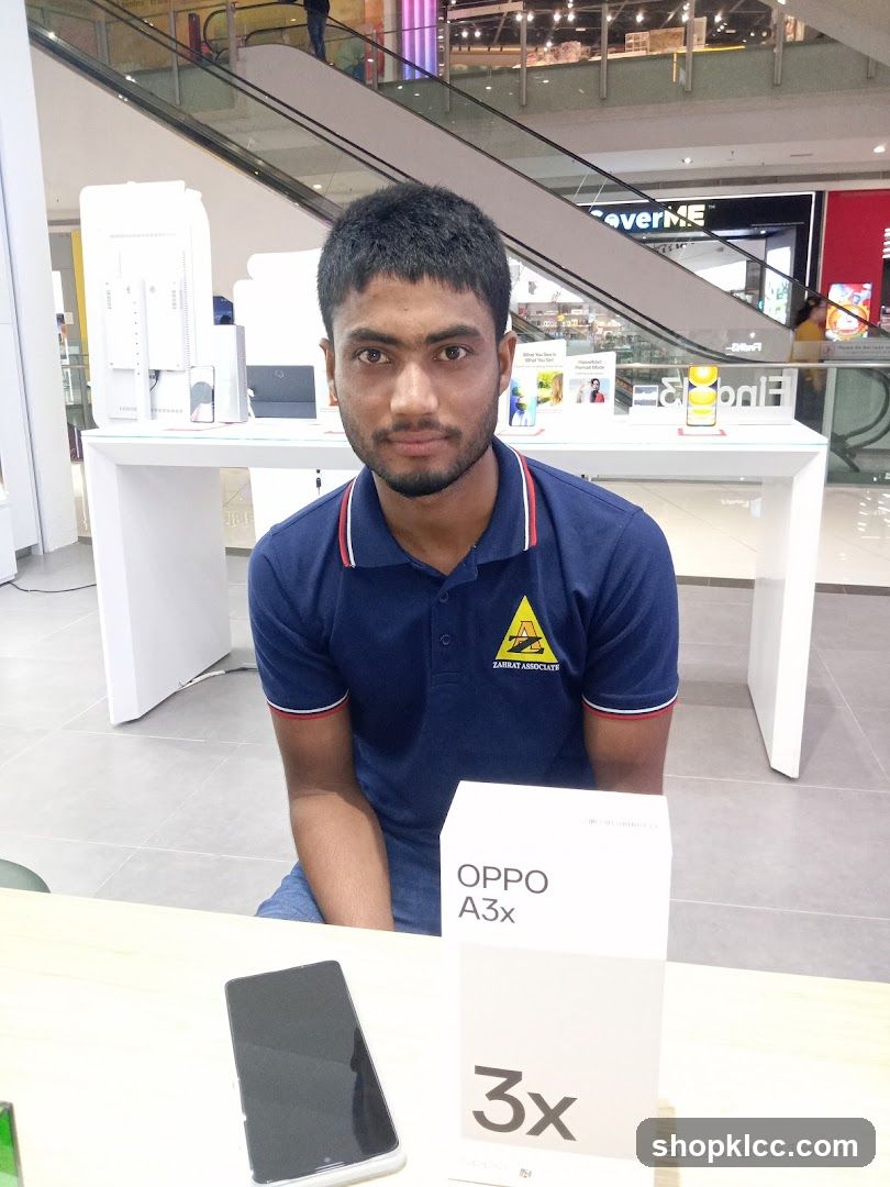 Man with OPPO A3x box