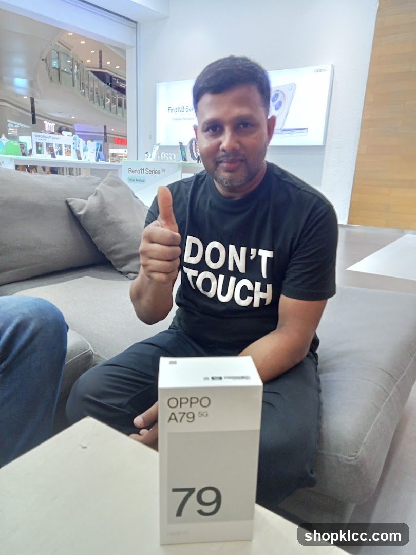 Man with OPPO A79 5G box