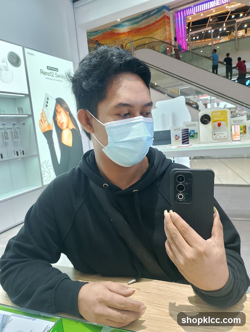 Man taking a selfie in a store
