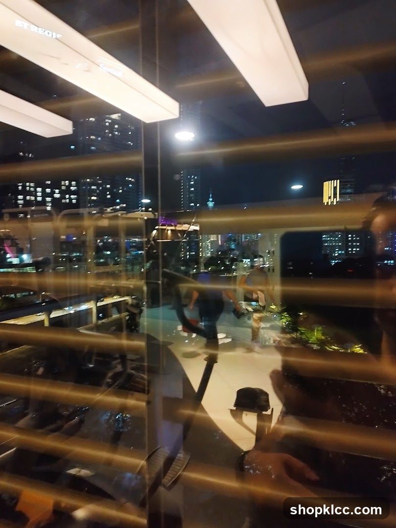 Interior view of a restaurant with city lights at night
