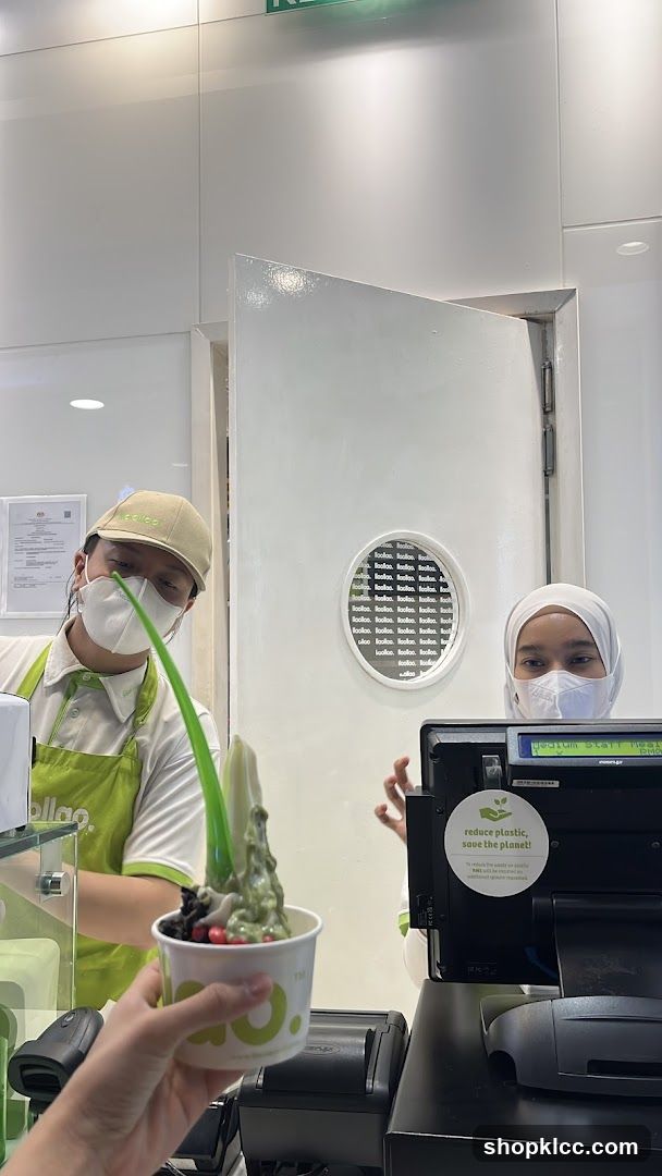 Staff serving frozen yogurt