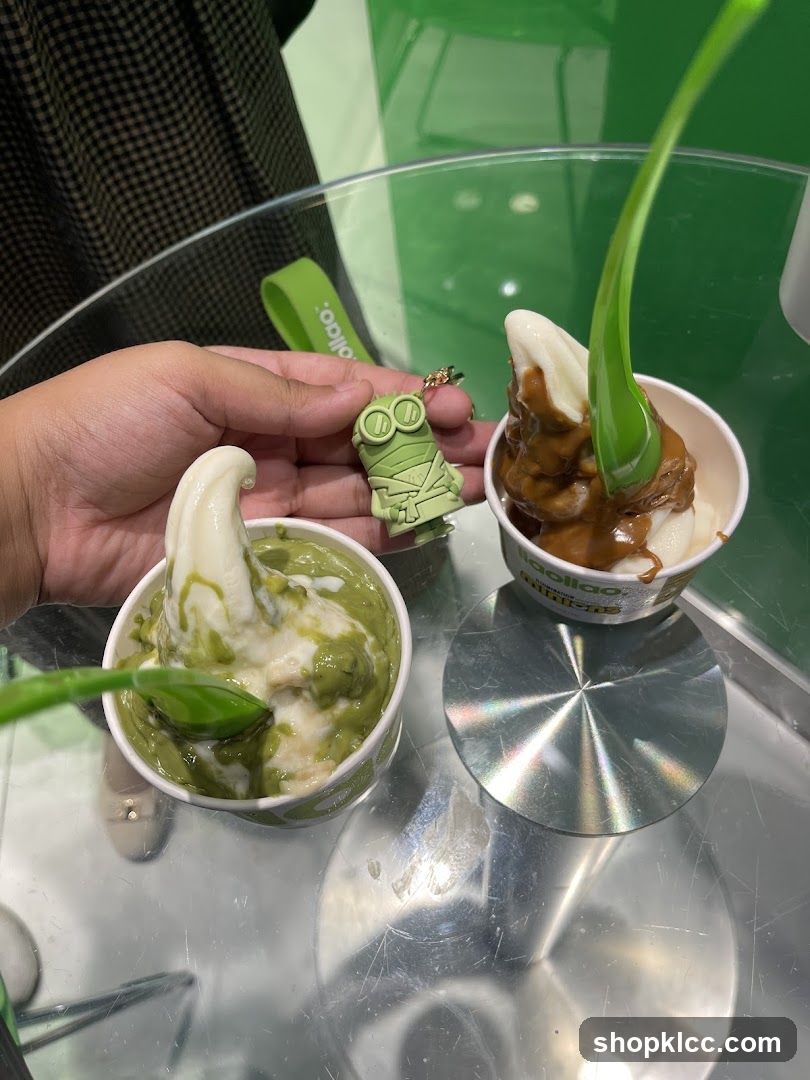 Two cups of froyo with toppings