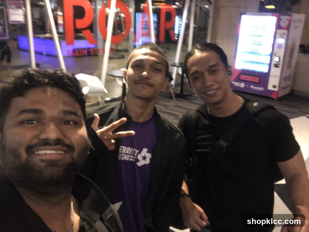 Three men posing for a selfie