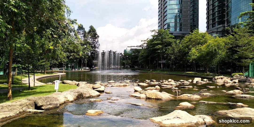Park with Fountain and Skyscrapers