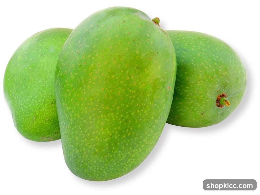 Three green mangoes