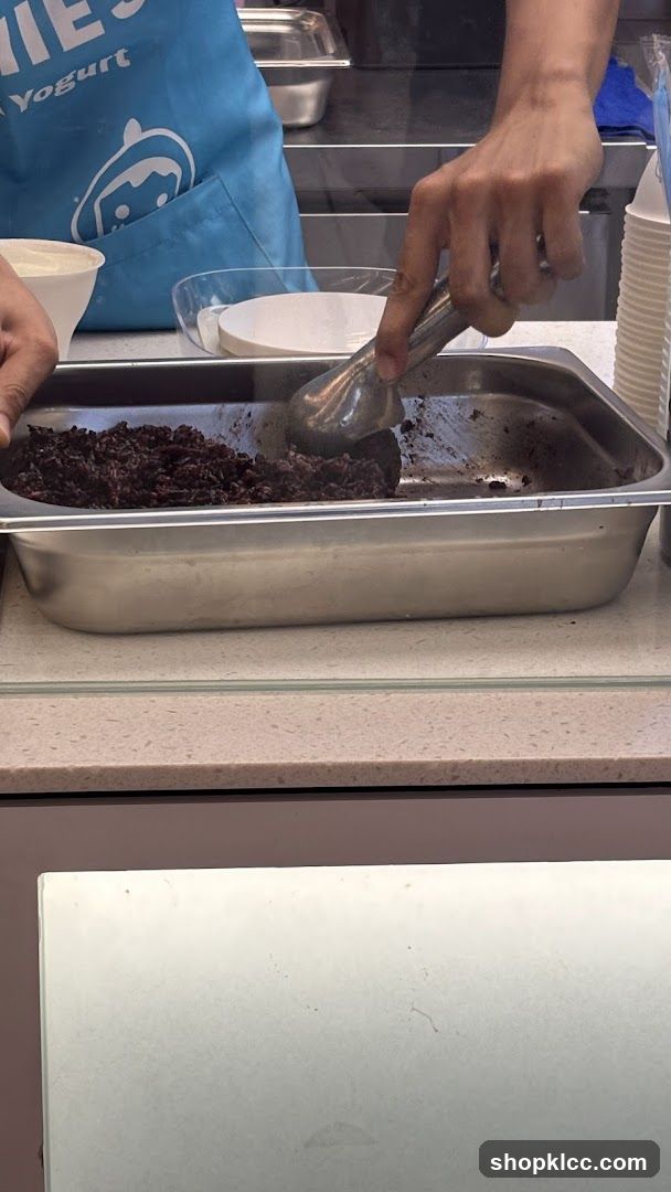 Scooping Dark Ice Cream