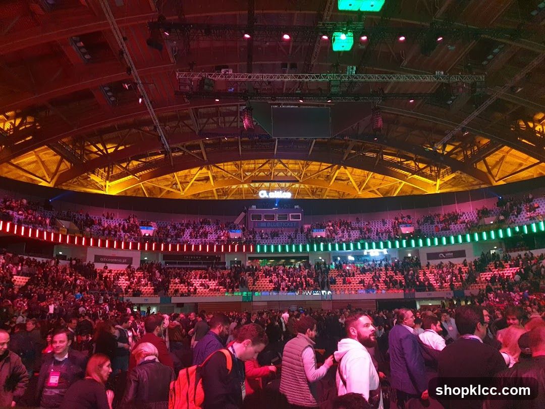 Crowded Arena with Colorful Lighting