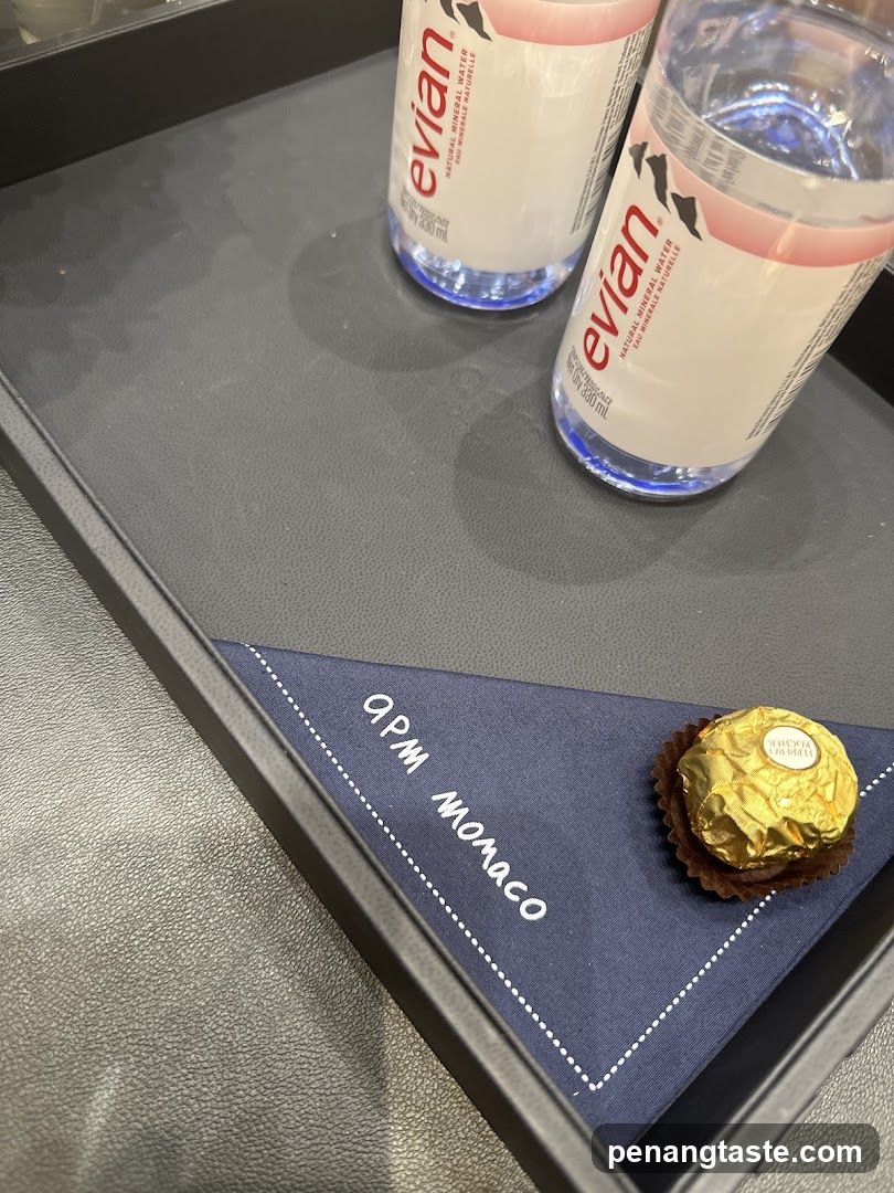 Tray with Evian Water and Chocolate