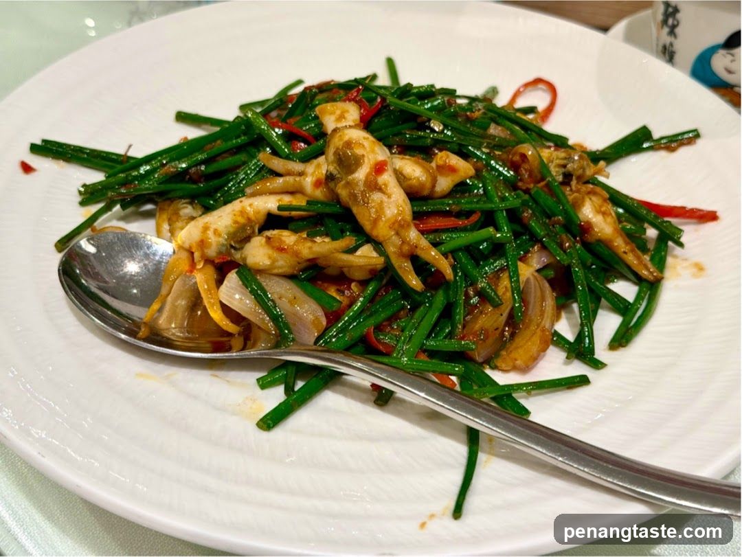 Stir-fried dish with seafood and greens