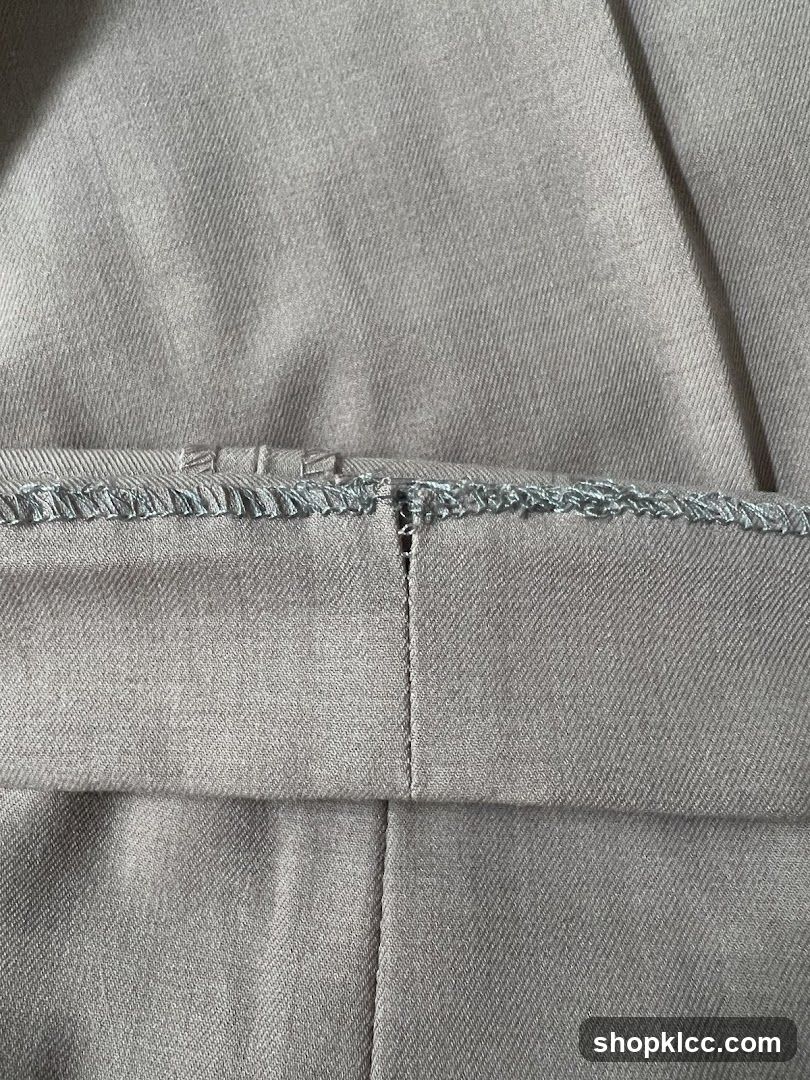 Close-up of a seam on light brown fabric
