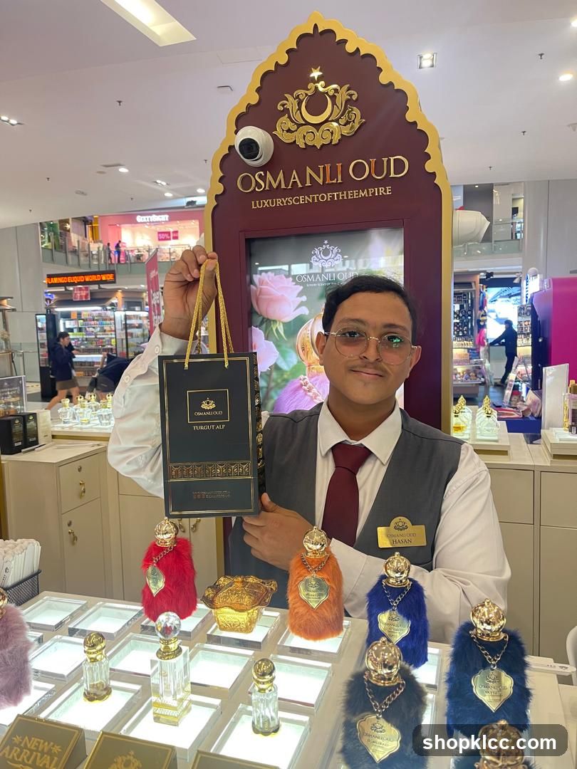 Perfume display with staff