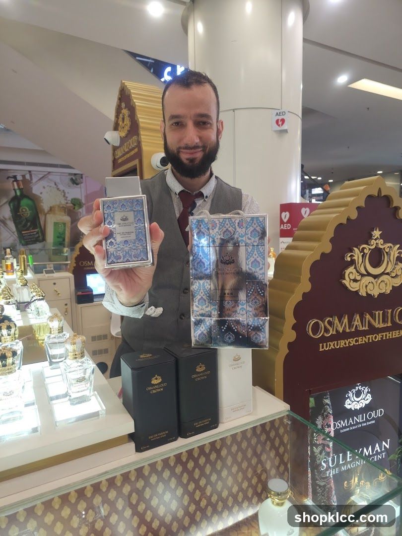 Perfume display with staff