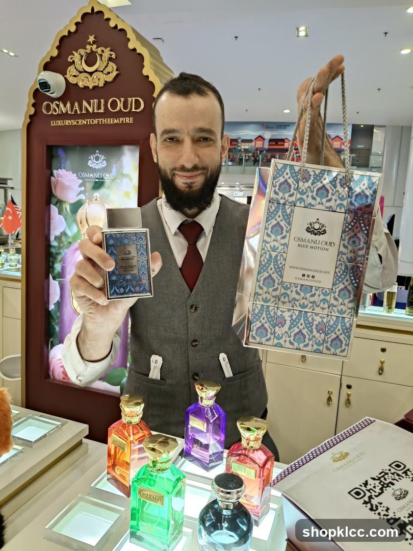 Man holding perfume bottle and shopping bag