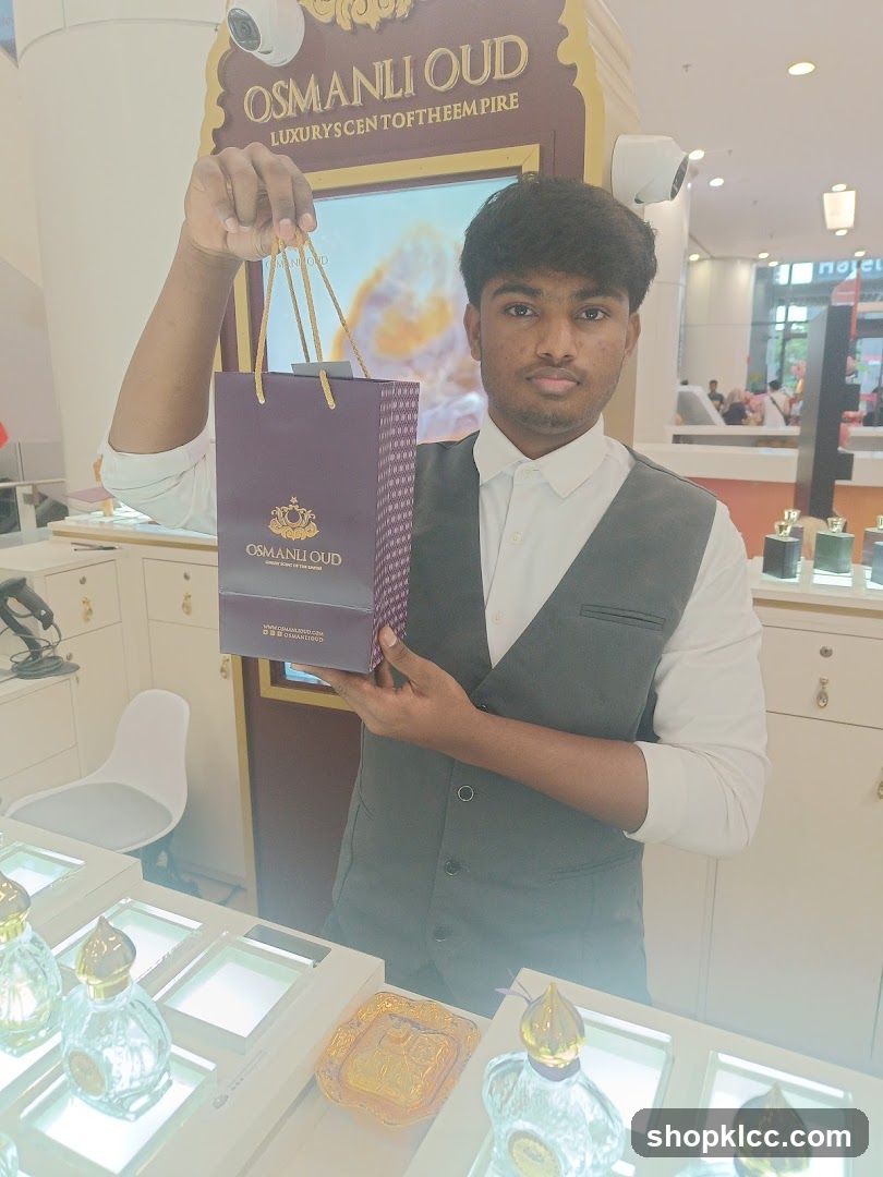 Sales Associate Holding Shopping Bag