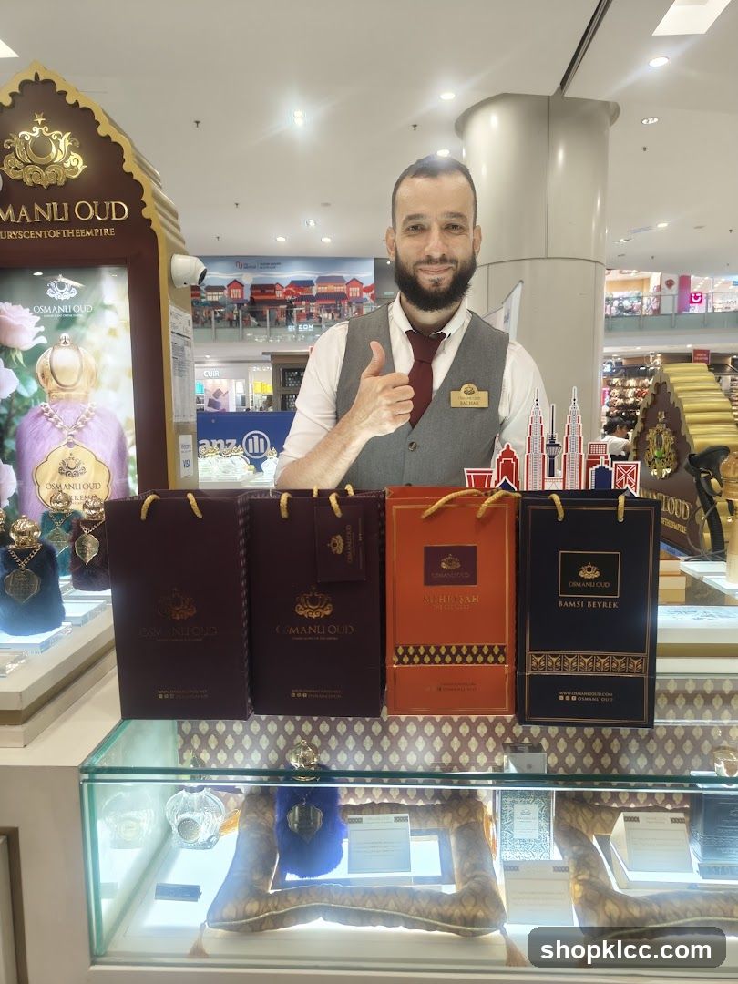 Perfume display with staff