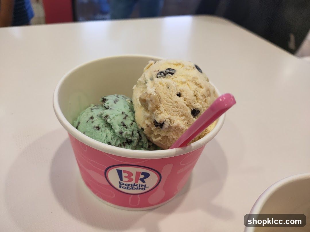 Two scoops of ice cream in a cup