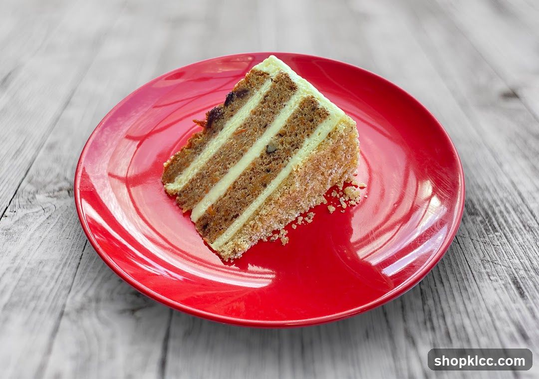 Slice of Layered Cake on Red Plate