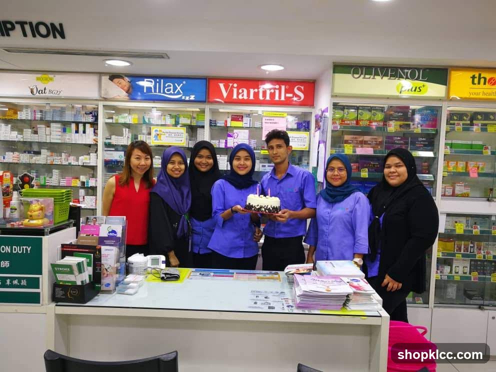 Pharmacy Staff with Cake